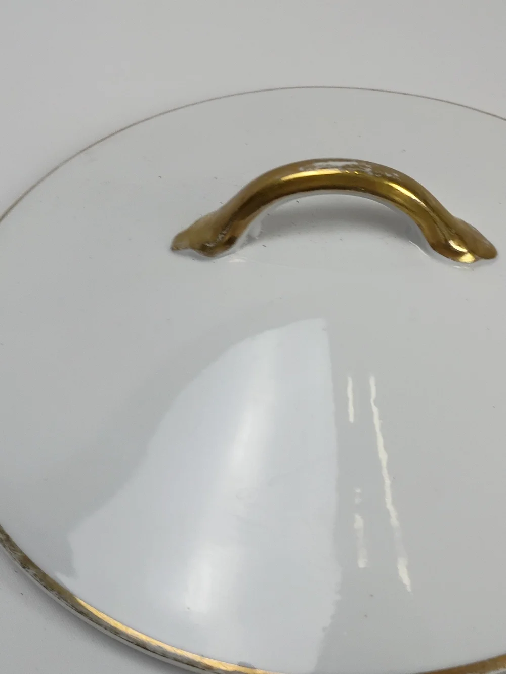 White Porcelain Covered Serving Bowl with Gold Handle